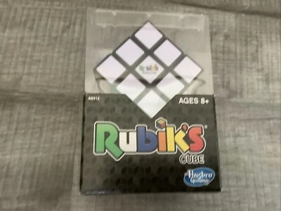 NEW Official Rubik's Cube 3x3 Original Puzzle with Display Stand - Hasbro A9312 - Image 1 of 4