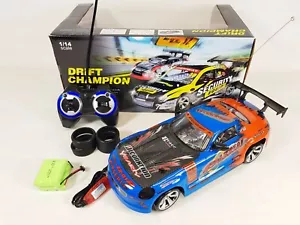 RC Drift 4WD Nissan Skyline Radio Remote Control Car Rechargeable Motive Tyres - Picture 1 of 9