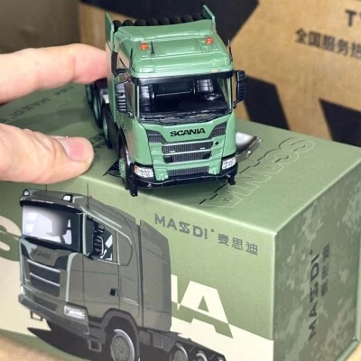 Camión de metal fundido a presión modelo SCANIA R650 verde militar Masdi 1:64 en stock Foto 1 de 4