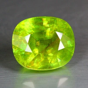 7.67ct_"Untreated"_"Oval"_"Green"_"100 % Natural Green Sphene"_"Pakistan - Picture 1 of 3
