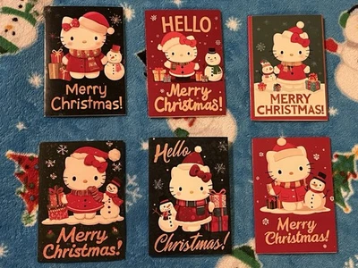 Tarjeta de felicitación navideña Holiday Hello Kitty con sobre Foto 1 de 4