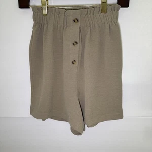 Nuevo con etiquetas Pantalones Cortos Luna y Estrellas Cintura Elástica Plisada Botón Enemigo Bronceado Niñas Talla M 10/12 - Imagen 1 de 5