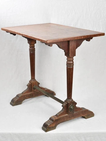 Early 20th century oak bistro table w/ brass footrest - 21¾" x 31½" Cover