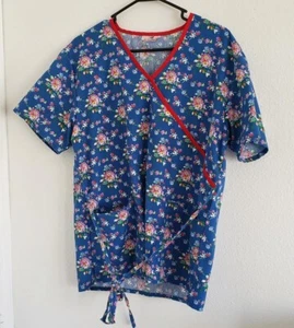 Expo Uniform Inc Damen blau Blumen Scrub Shirt mit Taschen Größe Medium - Bild 1 von 6