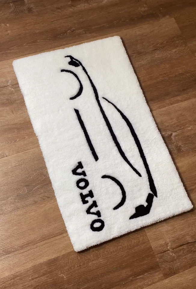 Alfombra hecha a mano acolchada VOLVO EX30: tenue: 69 cm x 40,5 cm Foto 1 de 1