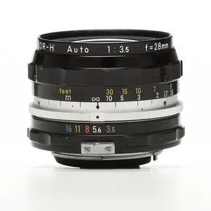 Nikon Nikkor 28MM 1:3.5 F3.5 Wide Angle 35mm Lens + Original box + manual - Picture 1 of 4