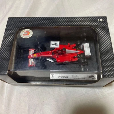 Hot Wheels 1/43 Ferrari F2002 Michael Schumacher modellino auto pressofuso - Immagine 1 di 4