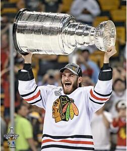 Brandon Saad Blackhawks Unsigned 2013 Stanley Cup Champs Raising Cup Photo