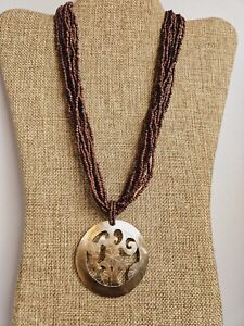BROWN BEADED MULTI STRAND SHELL PENDANT NECKLACE 
