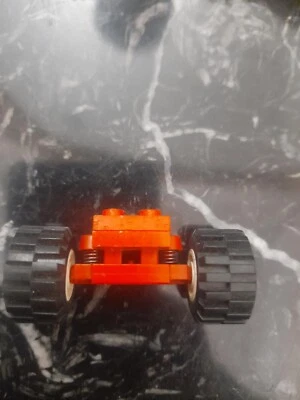 LEGO Technic Wheel Units with Spring Suspension RED & 2 White Wheels - Image 1 of 4