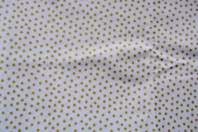 1.33 yards tiny golden stars Emmamila Cotton 44" wide plus a hefty tail - Image 1 of 2