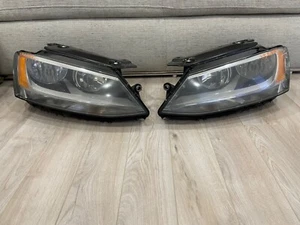 2012 - 2016 Volkswagen Jetta headlights set left and right halogen OEM used - Picture 1 of 8