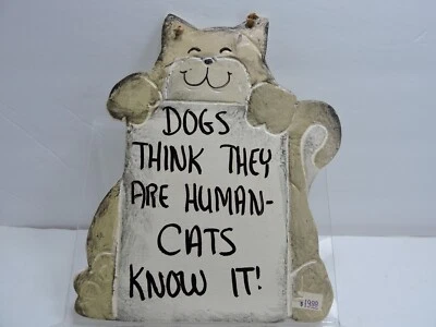 Los gatos son signos humanos tipo cerámica Cuelga en cualquier lugar y es adorable Foto 1 de 4