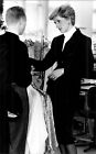 Princess Diana looks at men's clothes in silk - Vintage Photograph 689051