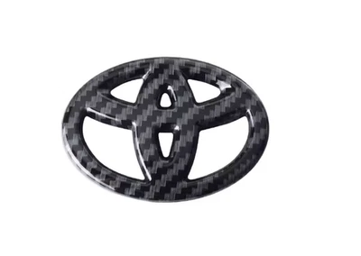 Logotipo del volante con emblema de fibra de carbono para Toyota Corolla Camry Foto 1 de 4