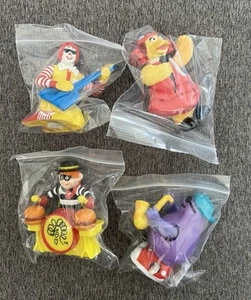 Juego de 4 juguetes de cuerda McDONALD'S HAPPY FOOD ROCK N' ROLL BAND 1993 de colección - Imagen 1 de 10