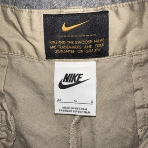 Nike Men's Life Pleated Chino Shorts Khaki Size 34 White Swoosh On Leg - Picture 1 of 9