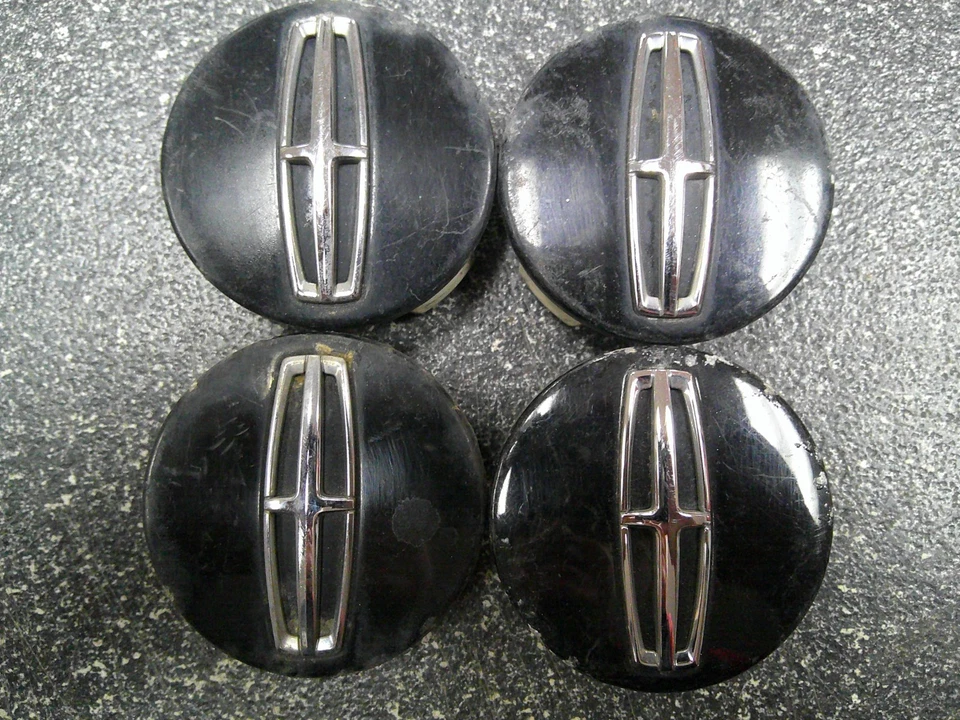 Tapas centrales negras Lincoln MKC OEM 2-1/8" 54 mm DPSC-1A096-AA BA - Juego/4 Foto 1 de 4