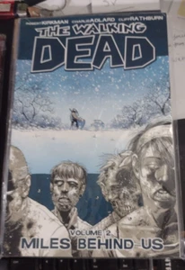 THE WALKING DEAD TPB VOL 2  MILES BEHIND US ROBERT KIRKMAN - Picture 1 of 2