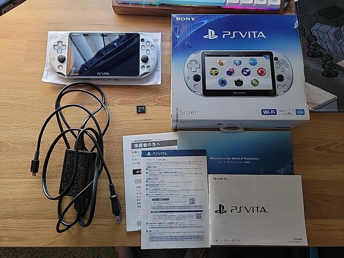 Sony PS Vita - PCH-2000 Silver Video Game Consoles for sale Sony PS Vita - PCH-2000 Silver Video Game Consoles for sale