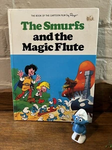 Juguete para caminar de cuerda de pitufo de colección y libro de flauta mágica y Los Pitufos - Imagen 1 de 9