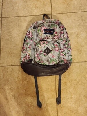 MOCHILA MUJER JANSPORT FLORAL GRIS/ROSA Foto 1 de 4