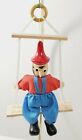 Vintage Pinocchio Doll Toy Figure Wood/ Cloth Sitting on a Swing 9"