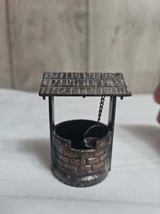BIENZO DE DESEOS miniatura con FIGURA fundida a presión de cubo, gira la perilla, eleva el cubo, de colección - Imagen 1 de 8