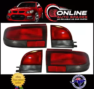 Holden Commodore Taillight + Garnish Light Kit VR VS Sedan Red / Clear bootlid - Bild 1 von 3