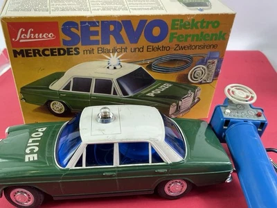 Raro 1961 Servo Schuco Elektro Hojalata a Batería Coche de Policía con Tapa de Caja Foto 1 de 4