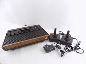 Atari 2600 Woody Console With Two Joysticks And Cables - Picture 1 of 3