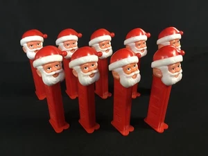 Nine PEZ Santa Claus Dispensers - Santa C - Introduced: 1996 - Retired - Picture 1 of 5