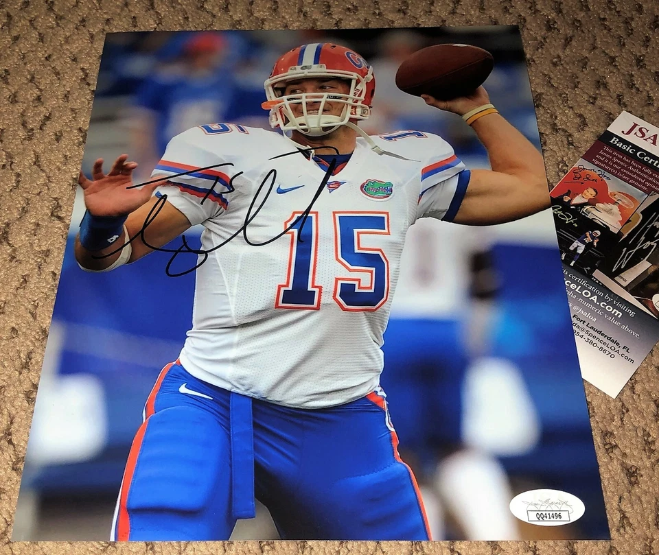 TIM TEBOW SIGNED 8X10 PHOTO AUTOGRAPH FLORIDA GATORS FOOTBALL JSA COA AUTO  - Image 1 of 1