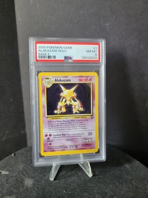 Graded PSA 8 2000 Pokemon Game - Alakazam 1/130 - HOLO Base 2 - Image 1 of 2
