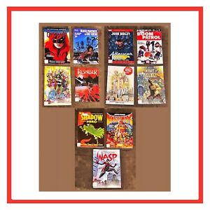 Lot 11 Comic Book Graphic Novel VG EXLIB Batwoman Black Panther Wasp Doom Patrol