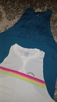 Tanque trasero 2 Vs rosa torcido Xsmall verde azulado usado en excelente estado blanco nunca usado  Foto 1 de 2