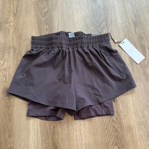 Pantaloncini da corsa sportivi Calia marrone scuro 2 in 1 Infinity nuovi con etichette taglia XS - Foto 1 di 8