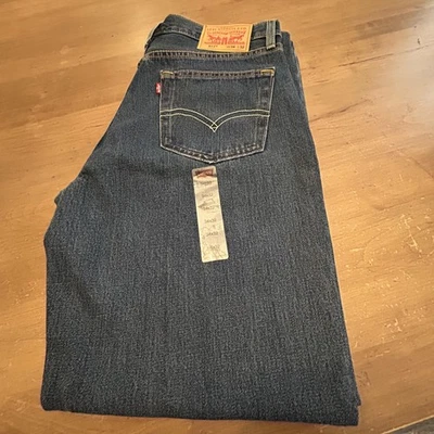 Pantalones de mezclilla Levis 511 para hombre 34x32 azul lavado oscuro calce ajustado cremallera lengüeta roja mosca Foto 1 de 4