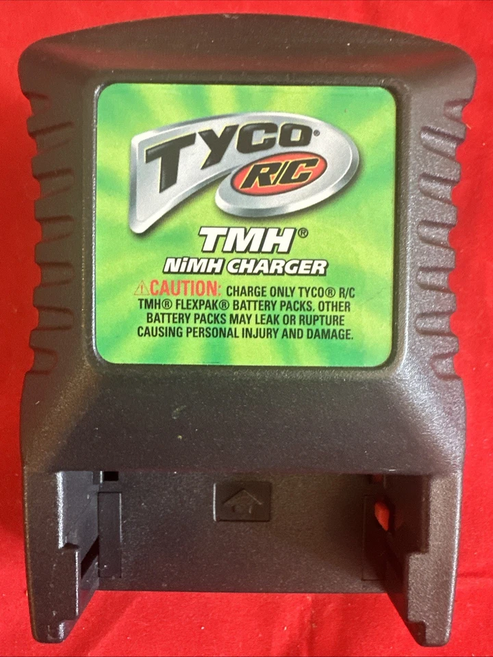 🏎️ TYCO R/C TMH Flexpak NiMH Battery Charger Only – Model 33005 - Image 1 of 4