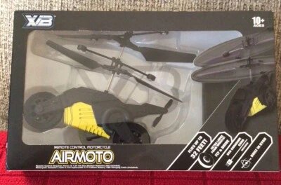 REMOTE CONTROL MOTORCYCLE AIRMOTO FLYS UP TO 32 FEET AGES 10+ FLY & DRIVE NEW - Image 1 of 4