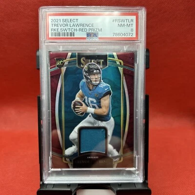2021 PANINI SELECT ROOKIE SWATCHES RED PRIZM TREVOR LAWRENCE ROOKIE RC PSA 8 - Image 1 of 2