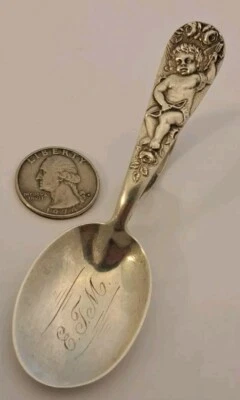 Cuchara antigua CUPID de Watson de plata esterlina bebé joven figura querubín c.1899 Foto 1 de 4