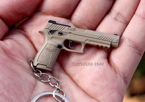TOY mini gun P320 M17 US ARMY full metal key chain toy gift 5cm - Picture 1 of 2