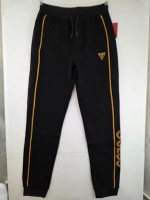 Joggers GUESS para niño talla 14 negros con ribete dorado logotipo José nuevos con etiquetas $34.99 Foto 1 de 3