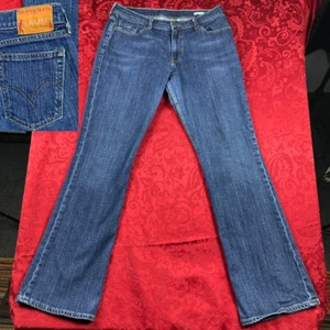Levi’s Premium Super Low Jeans Womens Size 33M Bootcut Med Blue Wash Denim VTG - Picture 1 of 13