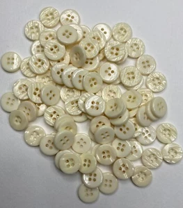 Lot of 100 Textured Ivory Sewing Buttons, Sewing, Crafts and Scrapbooking - Picture 1 of 3