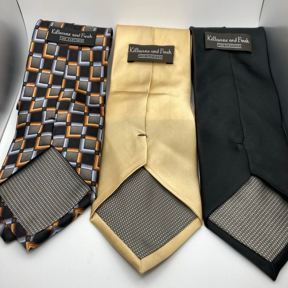 Corbatas de seda Kilburne and Finch 3 | Negro Dorado Naranja Geométrico | Ancho Clásico Foto 1 de 4