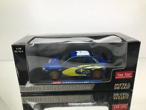 SUN STAR 4383 SUBARU IMPREZA WRC TEST CAR 2006 T.ARAI -BLUE 1:18- GOOD IN BOX - Imagen 1 de 10