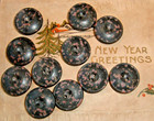 Fine Set of 11 Antique Composition 2-Hole Buttons w/ Mauve Pink Flecks on Black