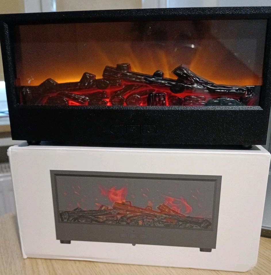 Design Luftbefeuchter. Kaminfeuer wohlfühl Atmosphäre  - Bild 1 von 4